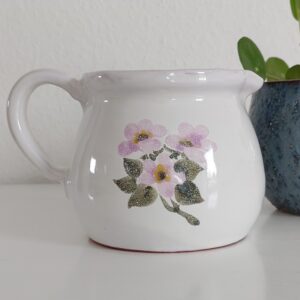 Kande med blomster